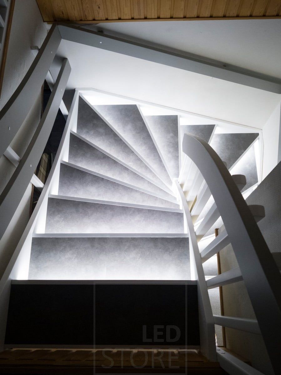 Led strips on stair treads to illuminate the staircase with indirect and atmospheric light